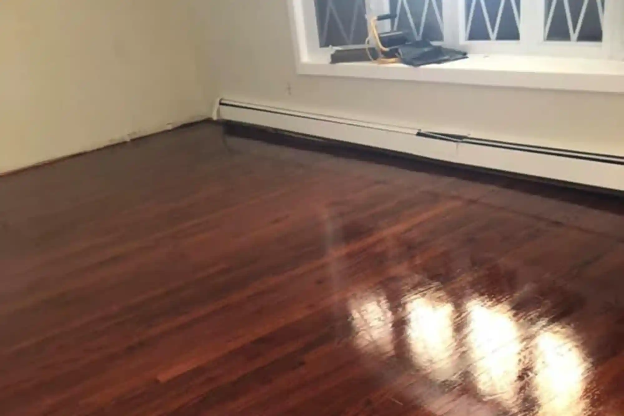 After-Sanding-Image_-_Restored-hardwood-floor-with-a-smooth-polished-finish-after-professional-sanding.webp