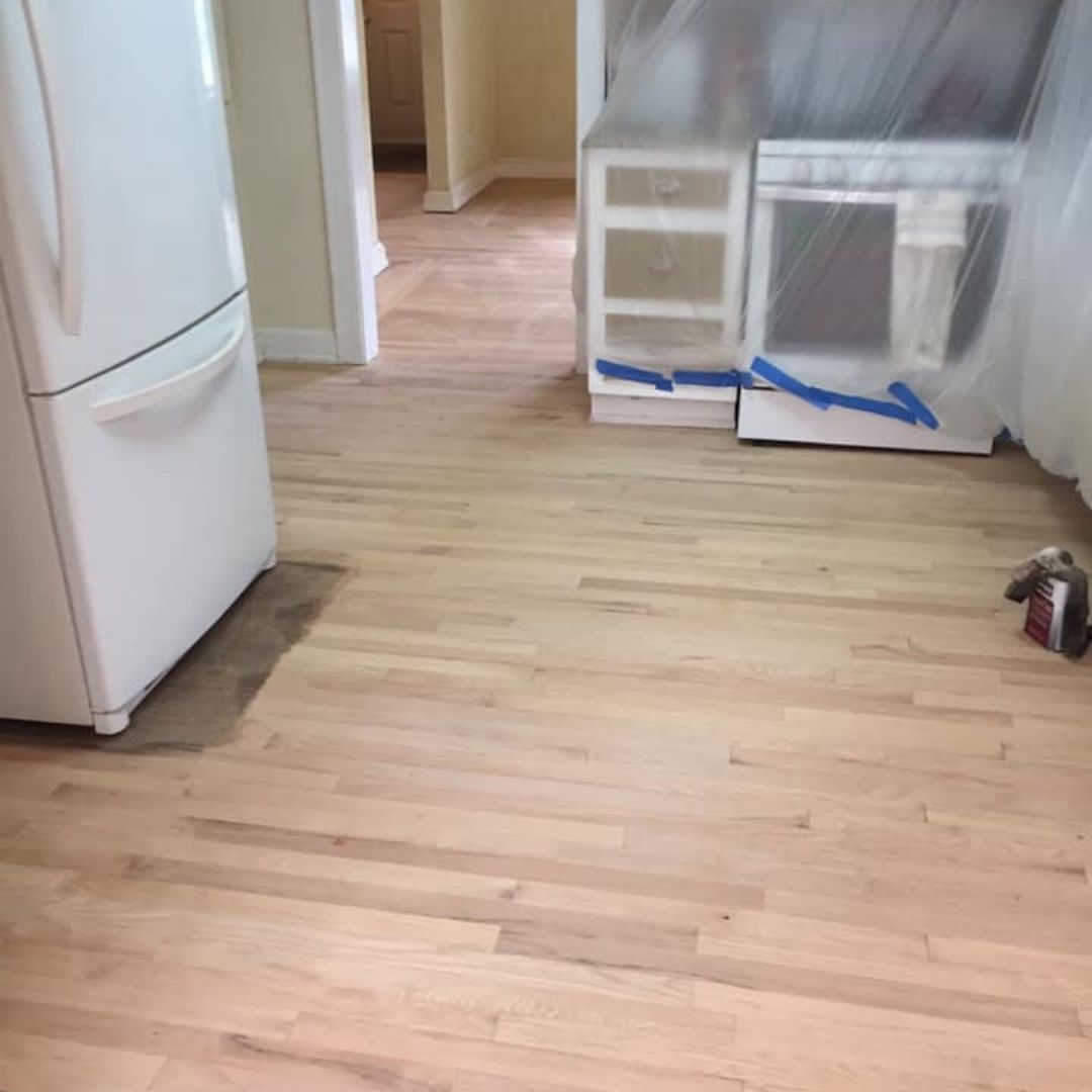 Hardwood-floor-sanding-and-refinishing-in-progress-professional-wood-flooring-restoration.jpg